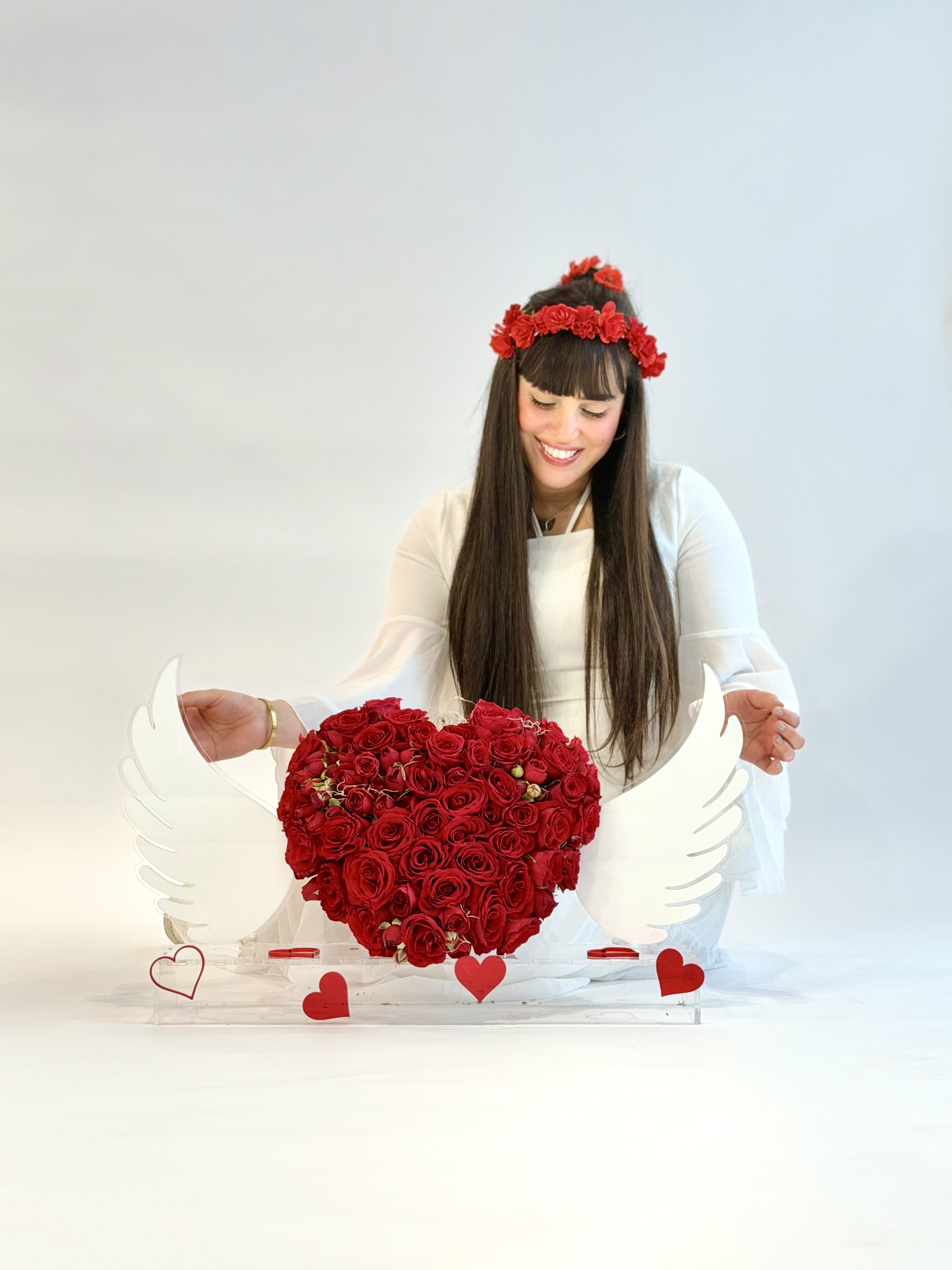 تنسيق الورد جناح الملاك